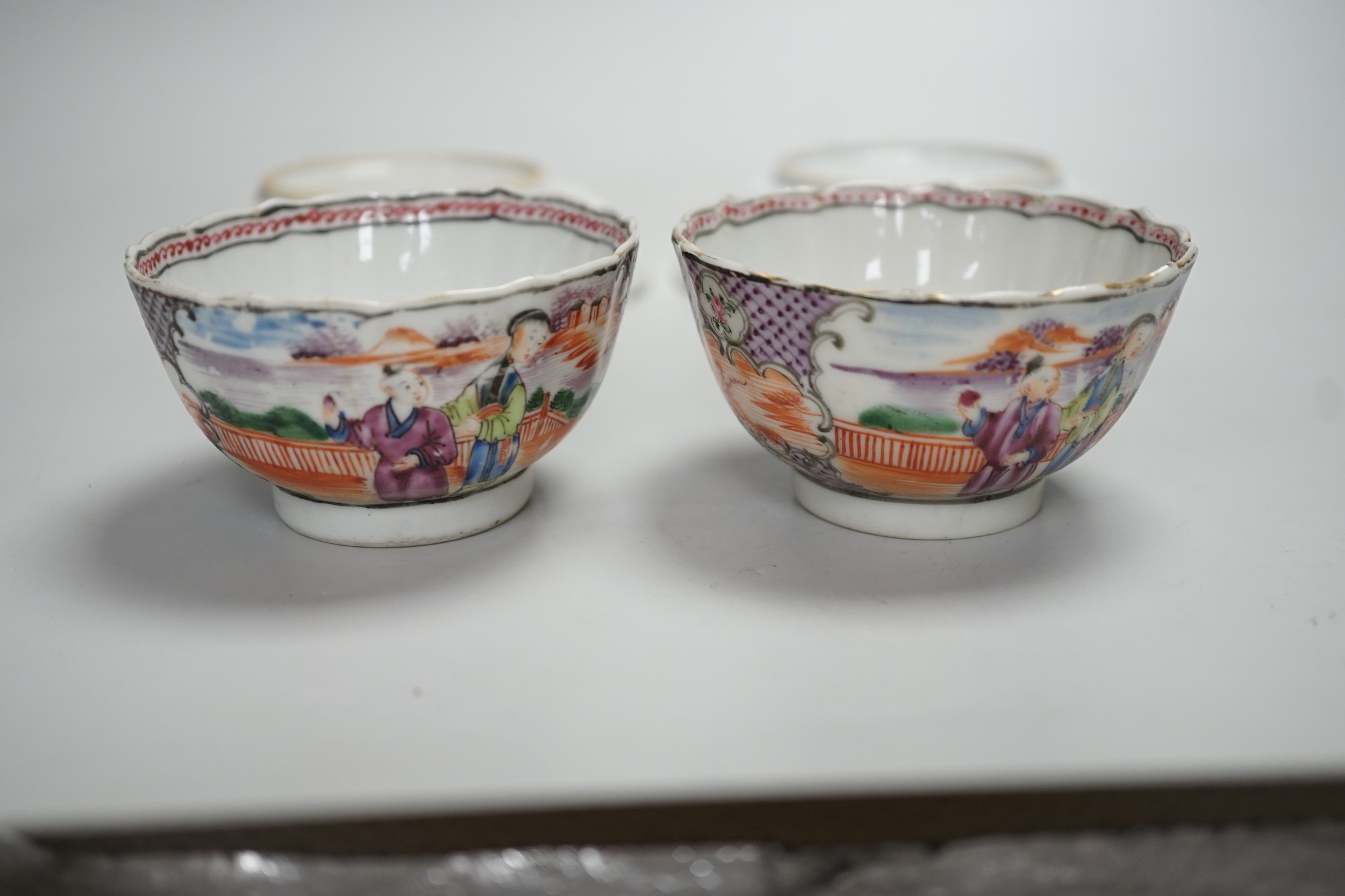 A pair of late 18th century Chinese export famille rose tea bowls and saucers. Saucers 13.5cm